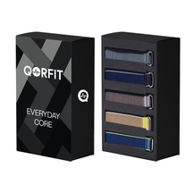 Qorfit Everyday Core Straps with black box and visible different minimal color straps inside on a white background