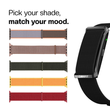 Collection of fitness tracker straps in various bright colors with Qorfit Pulse Smart Health Tracker